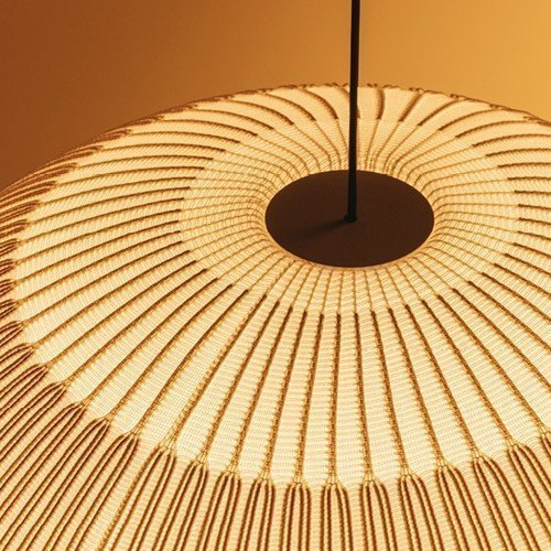 Detalle del tejido de poliéster ignífugo de la Knit 7455 con luz cálida Detalle del tejido de poliéster ignífugo de la Knit 7455 con luz cálida